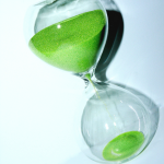 hour glass with green sand